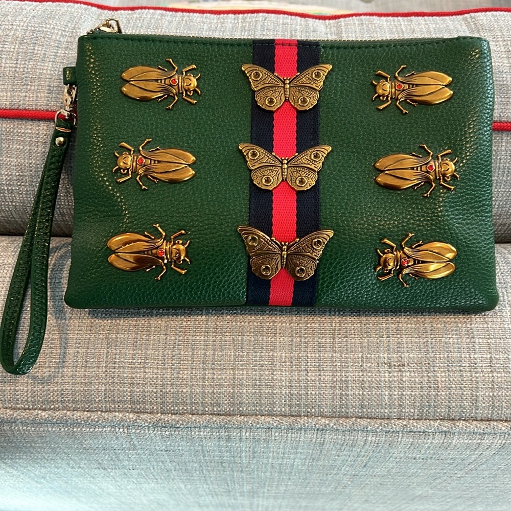 Butterfly and beetle clutch